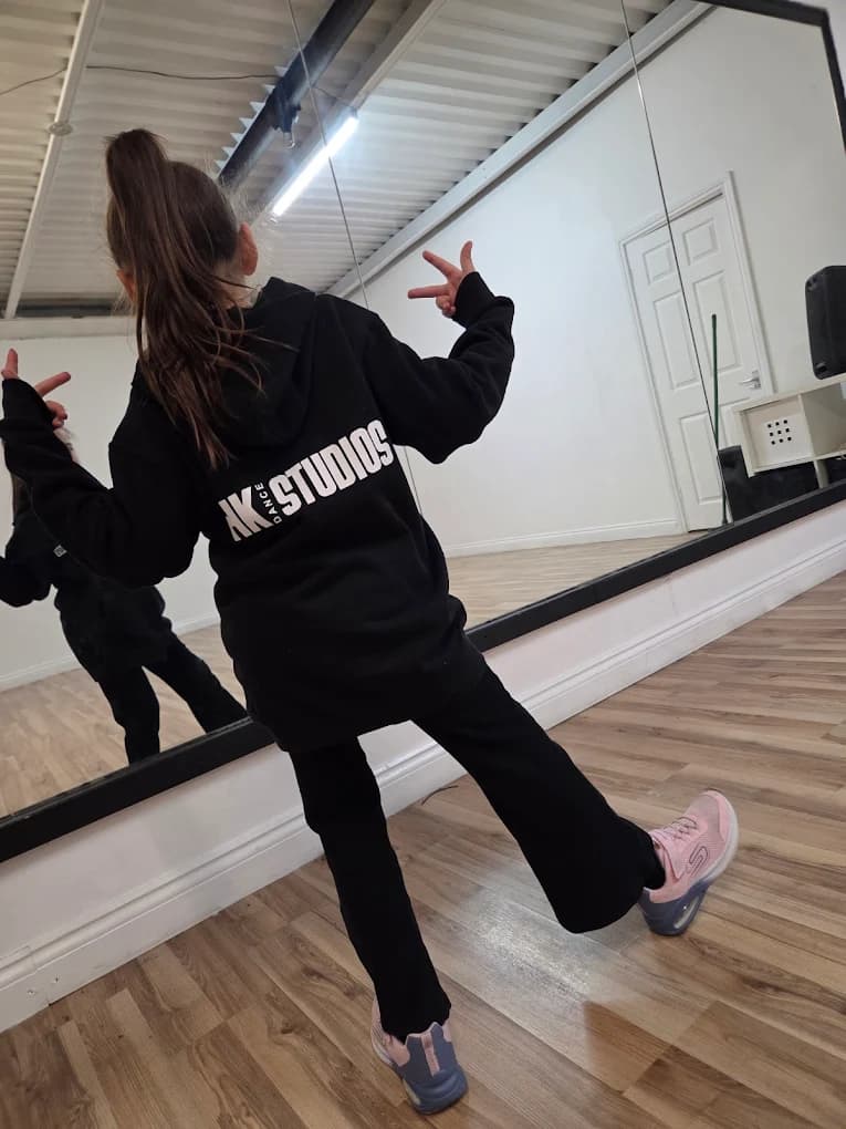 HK dancer in street dance pose at the studio